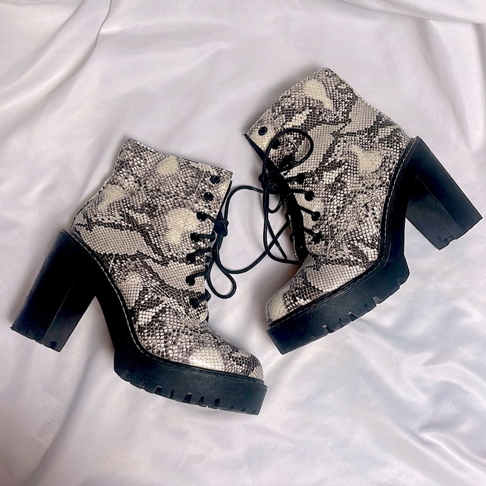 White black and grey snakeskin heeled combat boots